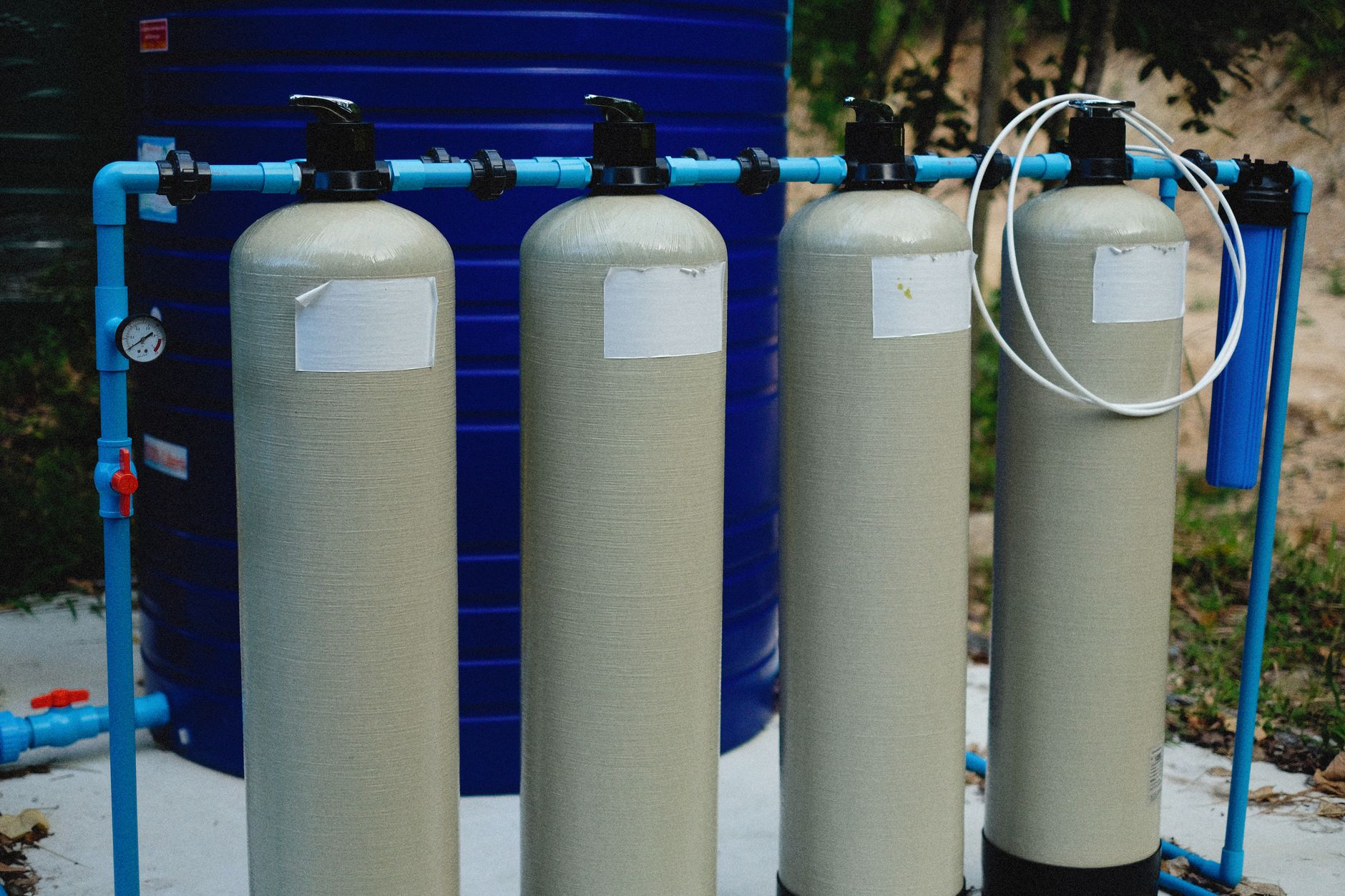 A pool equipment pad with pump and filter in a Yuma backyard home