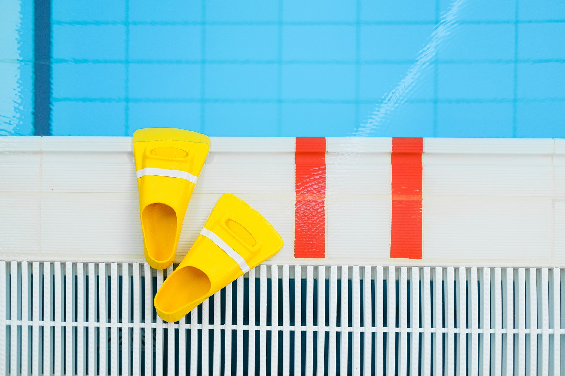 A pool inspector examining pool equipment at a Yuma Arizona home for sale
